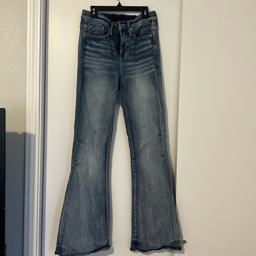 Women buckle jeans. Black style